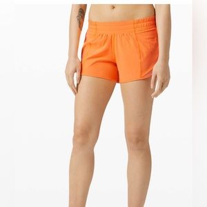 NEON ORANGE HOTTY HOT SHORT 4 INCH